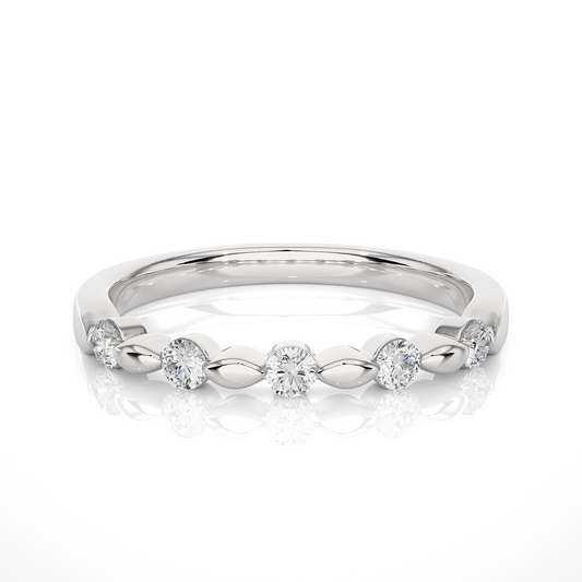Wedding band paired with an engagement ring