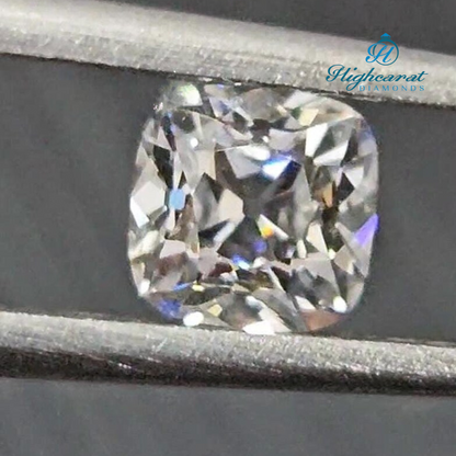 Cushion Cut Antique Style Diamond featuring large facets and warm light reflection