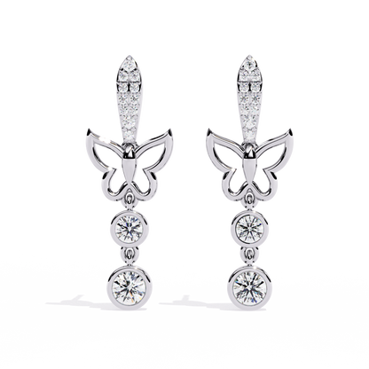 Open butterfly diamond dangle earrings in white gold
