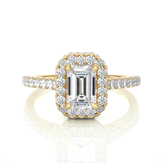Yellow gold engagement ring with emerald cut center diamond