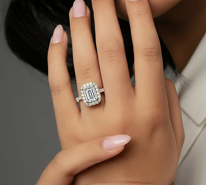 High jewelry emerald cut halo ring with reflective mirror finish