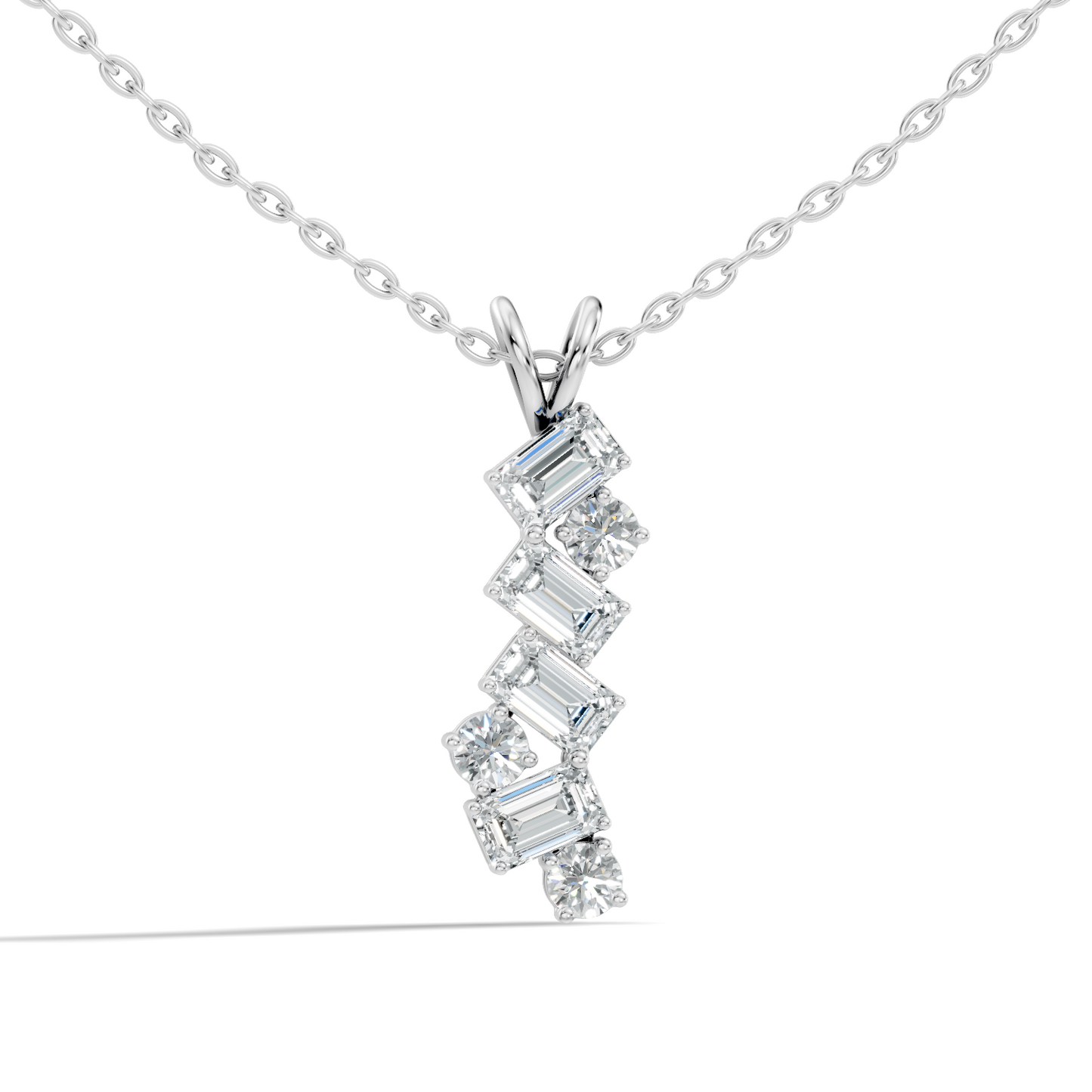 Angled view of vertical emerald and round diamond pendant necklace