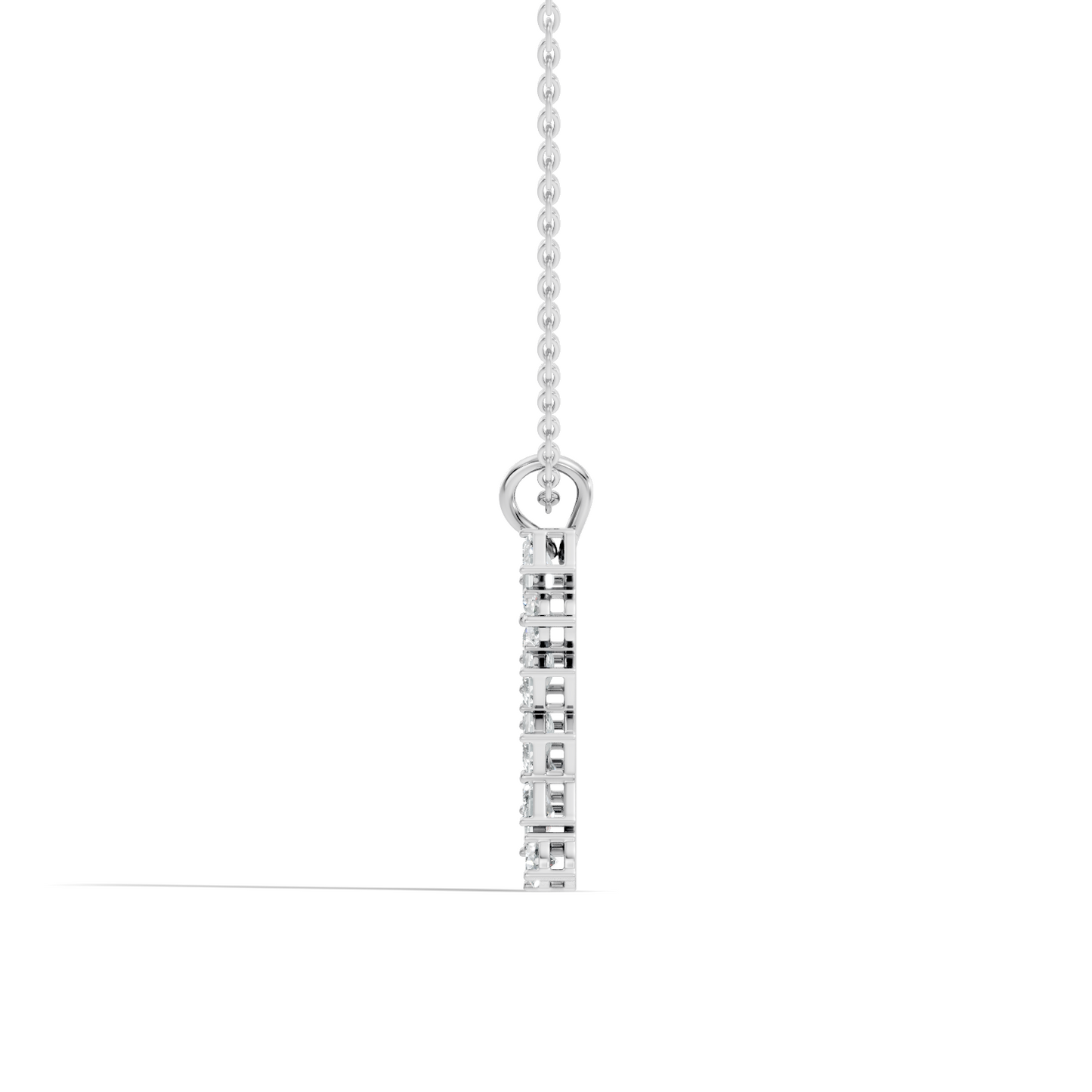 Side profile of emerald and round diamond pendant with vertical setting