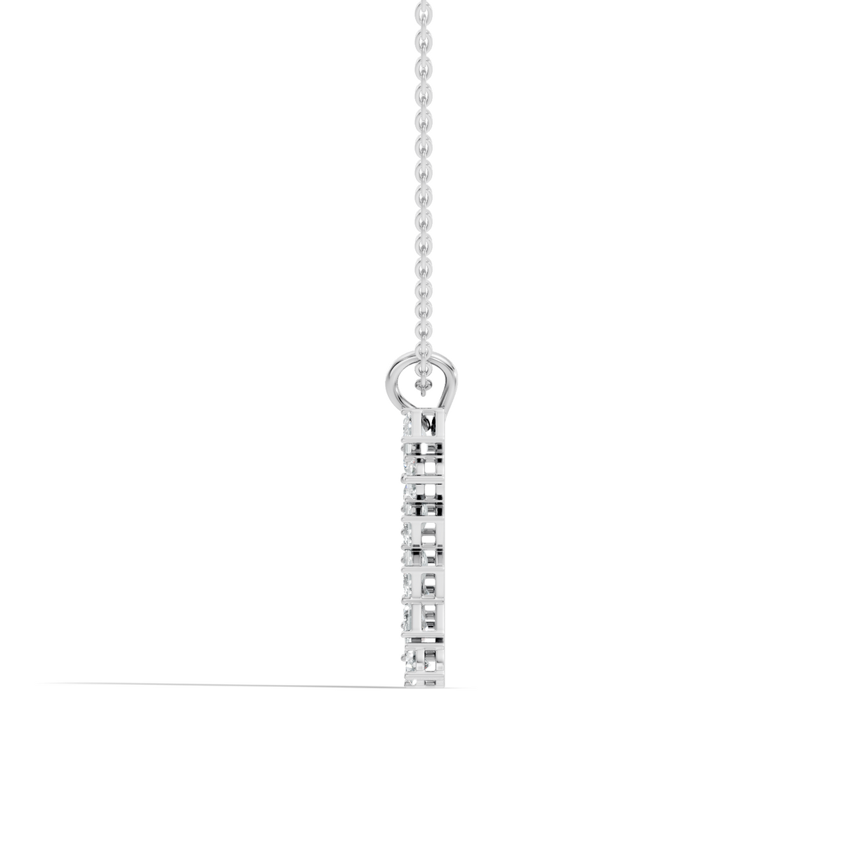 Side profile of emerald and round diamond pendant with vertical setting
