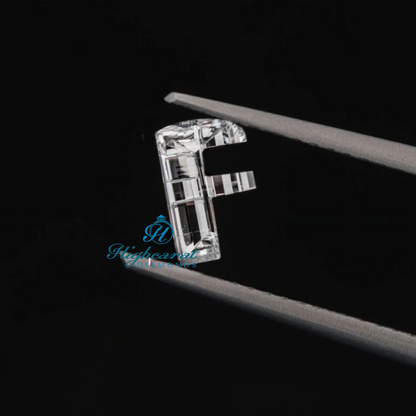 F Shape Step Cut Lab Grown Diamond featuring structured faceting and custom letter design