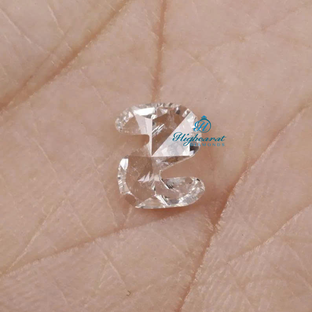 Fancy letter S shaped diamond crafted with smooth curves and bright brilliance