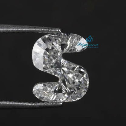 Alphabet inspired S cut diamond with symmetrical contours and structured facets