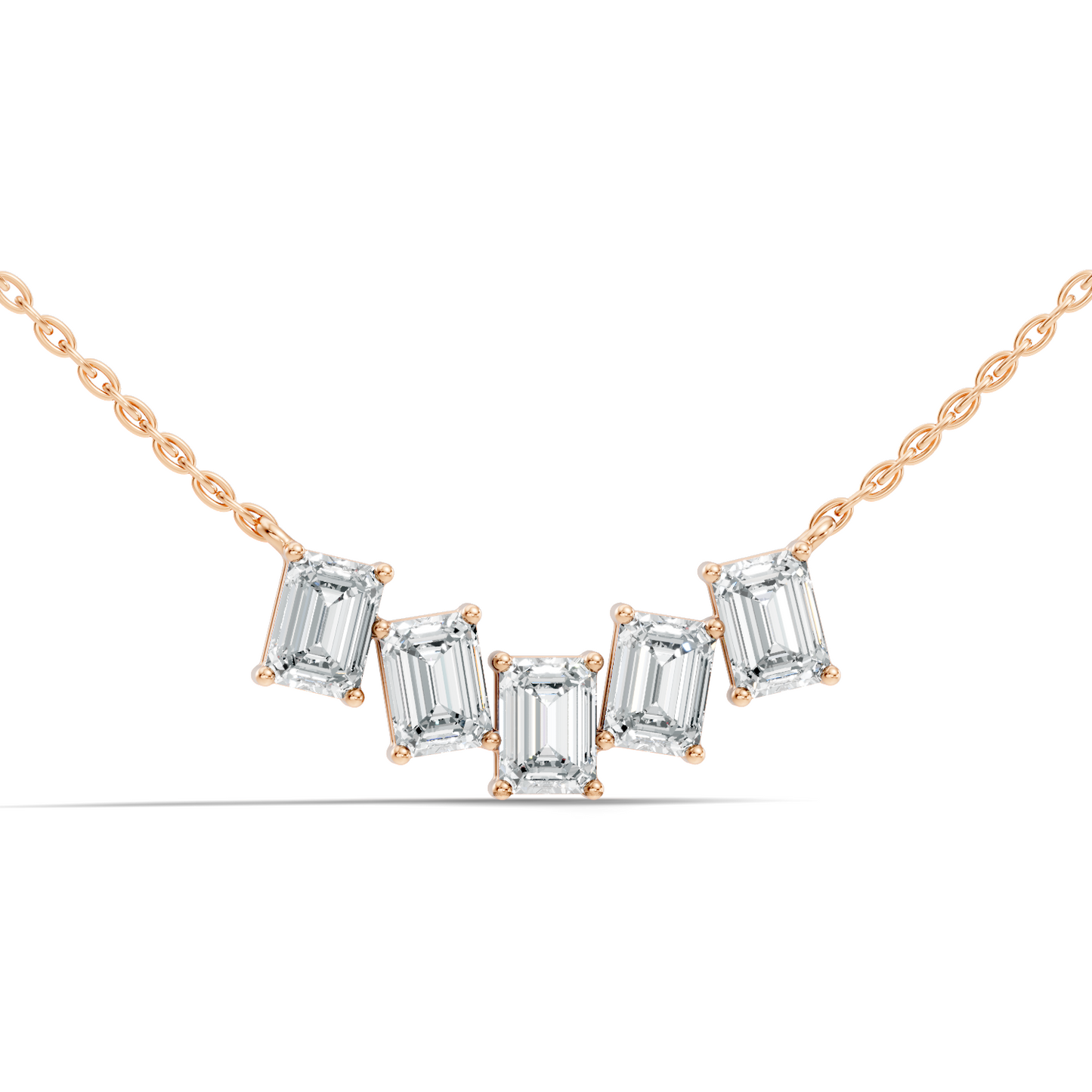 Rose gold emerald cut diamond necklace with floating design