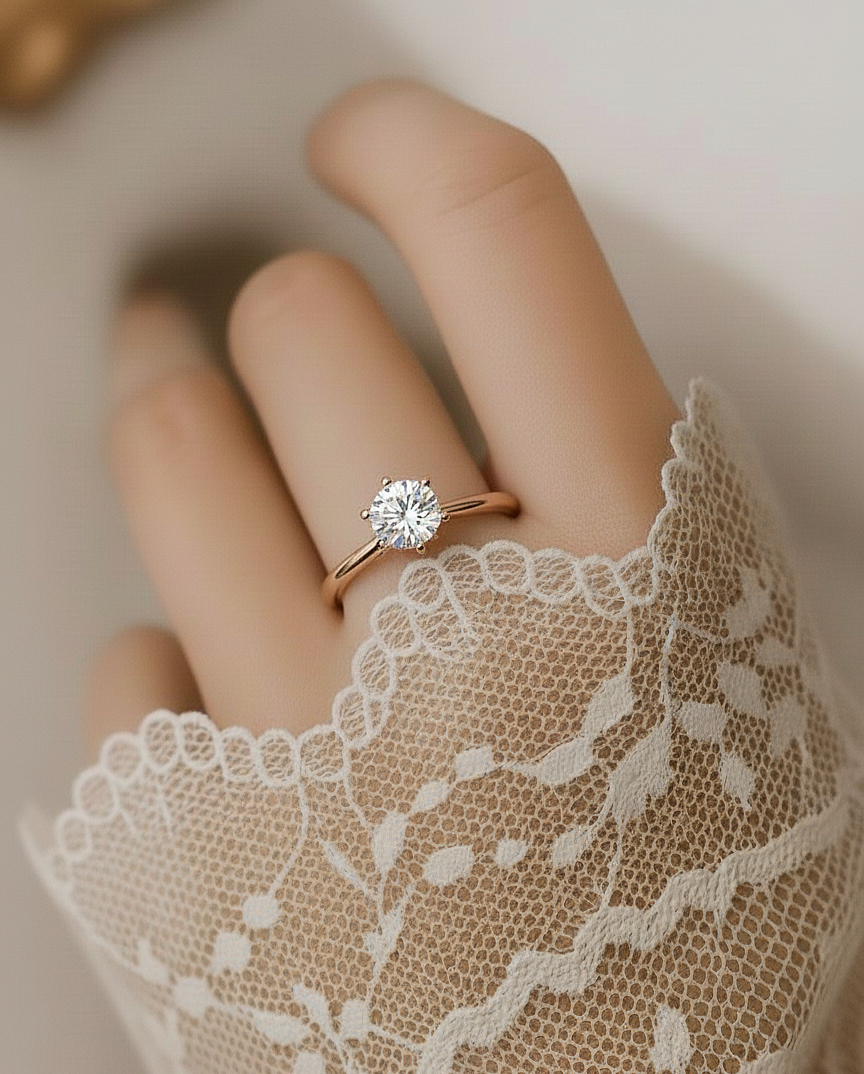 Angled view of round cut diamond ring with clean finish