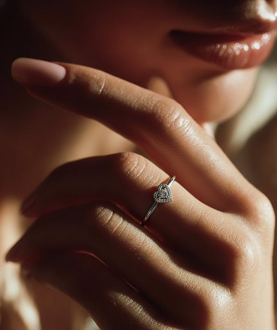 Angled view of round cut diamond proposal ring with clean finish
