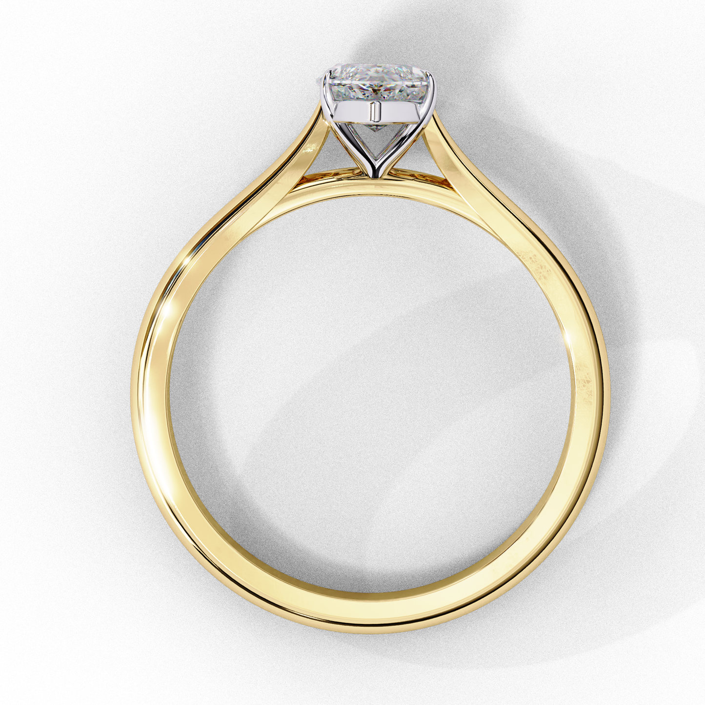 Close up of marquise cut solitaire diamond ring with polished band