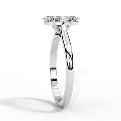 Angled view of marquise cut solitaire ring in white gold
