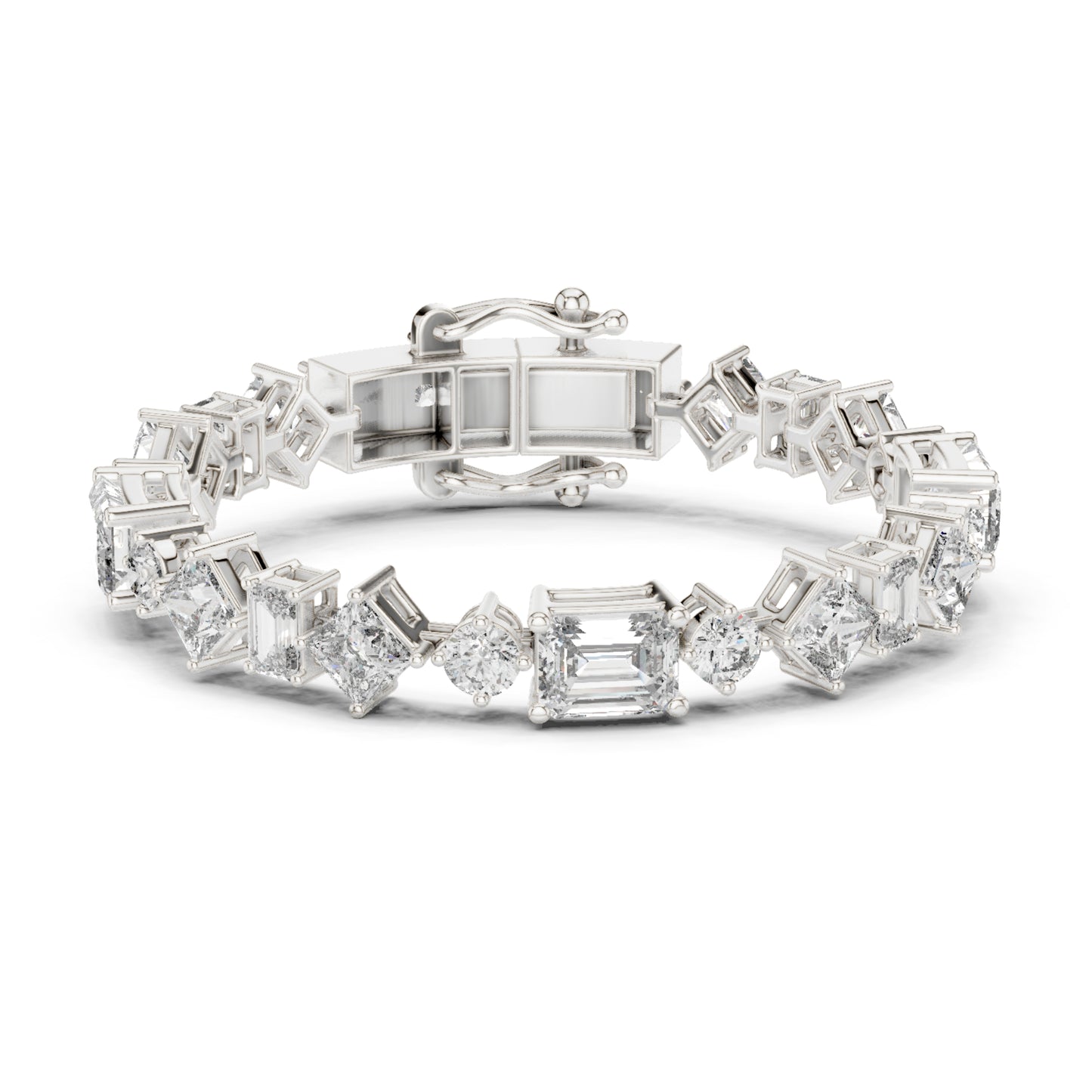 White gold tennis bracelet with emerald, princess and round cut diamonds