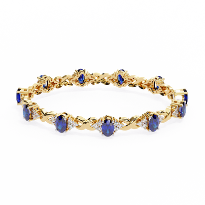 Oval blue sapphire tennis bracelet with lab grown diamonds