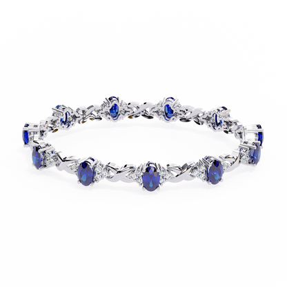 Blue sapphire and diamond tennis bracelet in white gold style