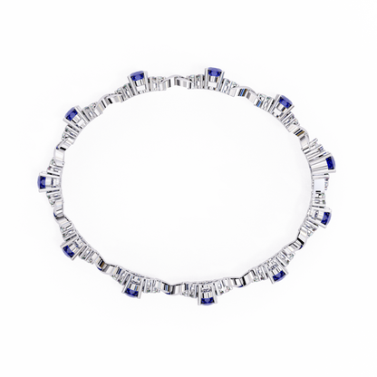 Lab grown diamond tennis bracelet with blue sapphire stones