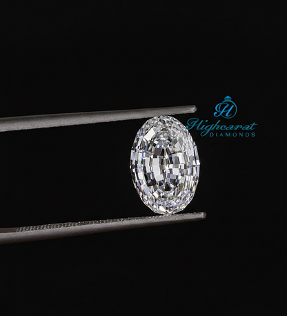Oval Portuguese cut lab grown diamond with intricate faceting and bright light reflection