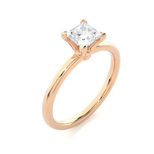 Close up of princess cut solitaire ring with detailed prong finish