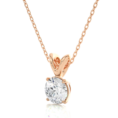 Angled view of round diamond solitaire pendant necklace in white gold