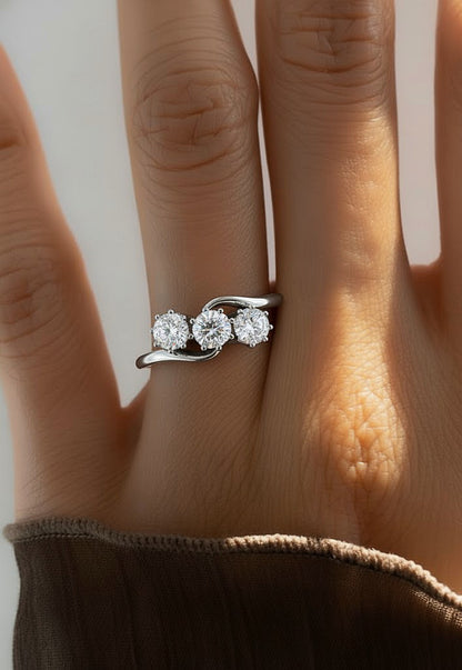 White gold three stone lab diamond ring styled on hand