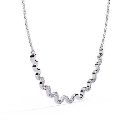 Contemporary white gold necklace with diamond wave pattern