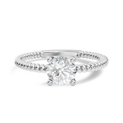 Solitaire Engagement Ring featuring round cut lab grown diamond center stone