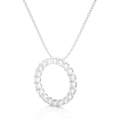 Angled view of round diamond circle pendant in white gold