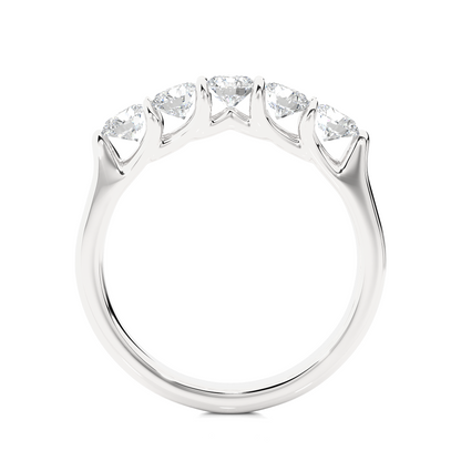 White gold eternity band with emerald cut diamonds