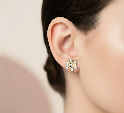 Diamond flower stud earrings with petal inspired setting
