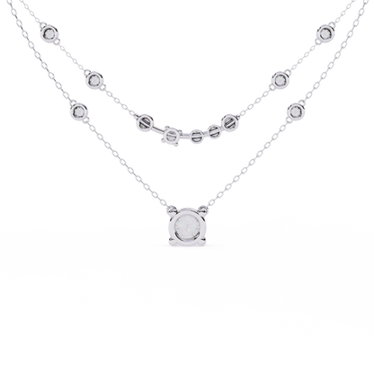 Fine layered diamond necklace with solitaire pendant drop