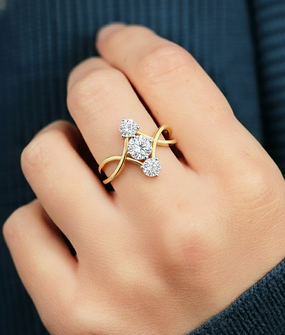 Close-up shot of round lab diamond engagement ring with triple stone setting, worn look