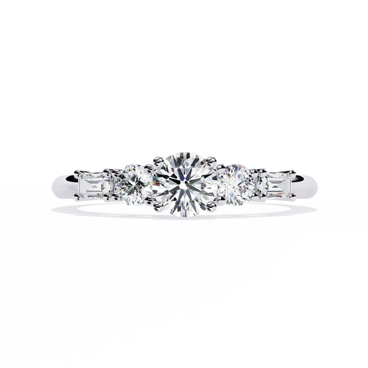 White gold ring with round center diamond and tapered baguette accents