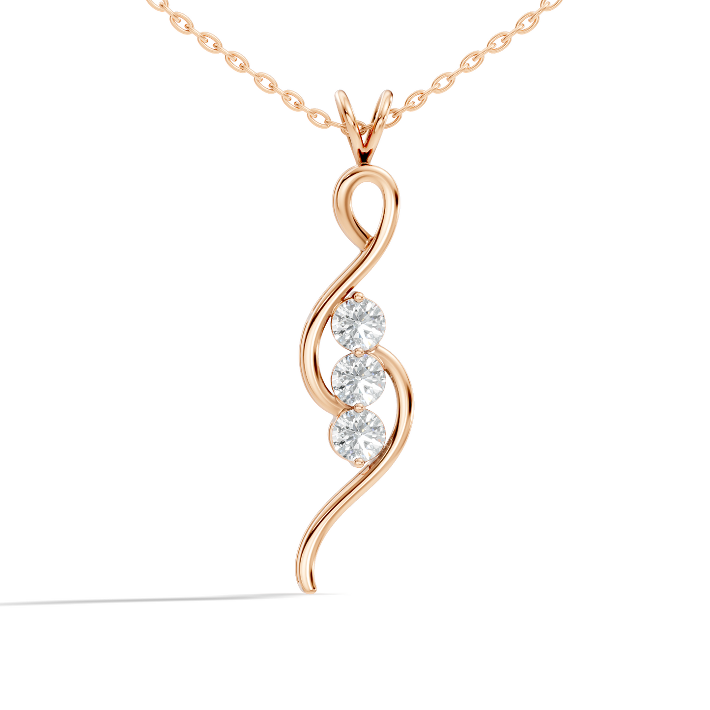 Rose gold swirl pendant with three stone diamond setting