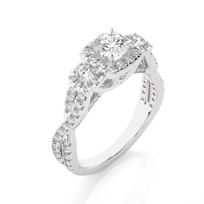 Romantic three stone engagement ring with vintage inspired halo