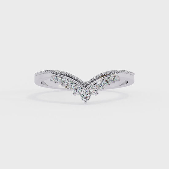 360 view video of V shaped lab diamond cluster band rotating on white background