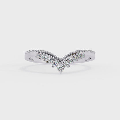 360 view video of V shaped lab diamond cluster band rotating on white background